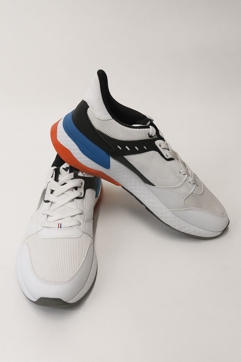 Xtep: White with Black/Blue/Orange Pattern