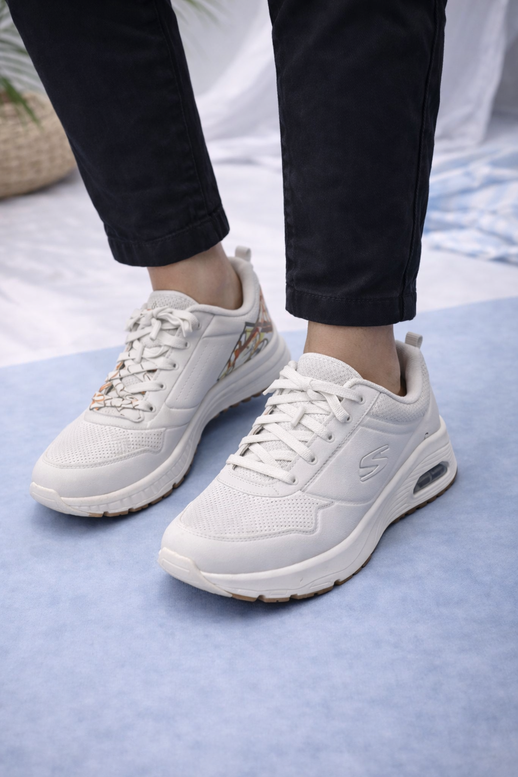 Skechers: White with Orange Patterns