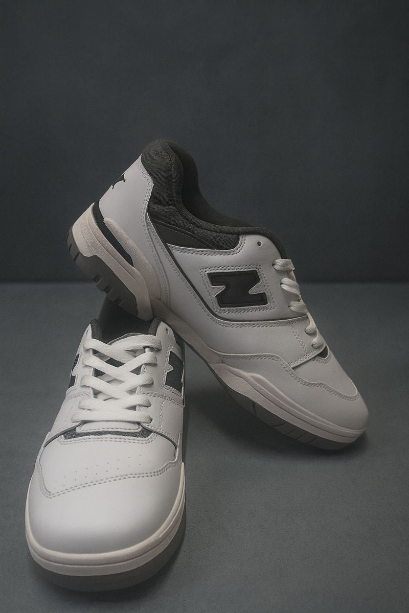 NB: White sneakers with black accents