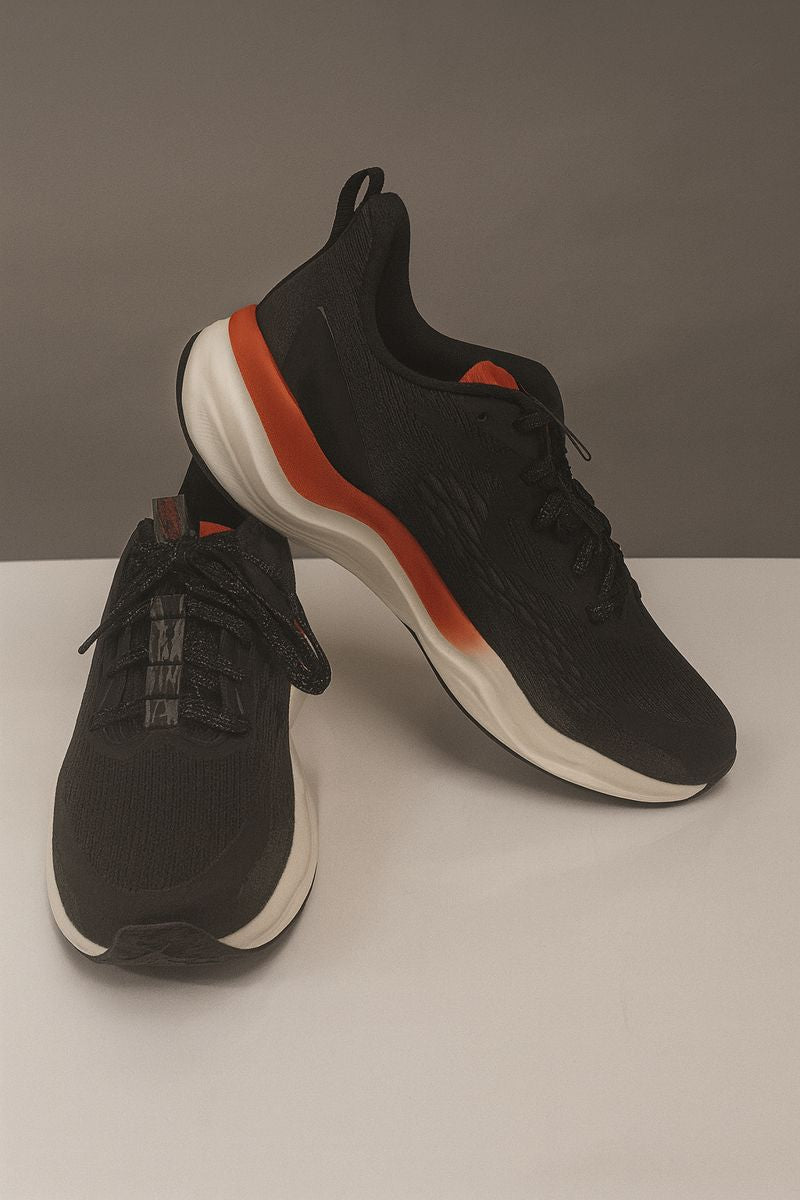 Xtep: Black and neon orange