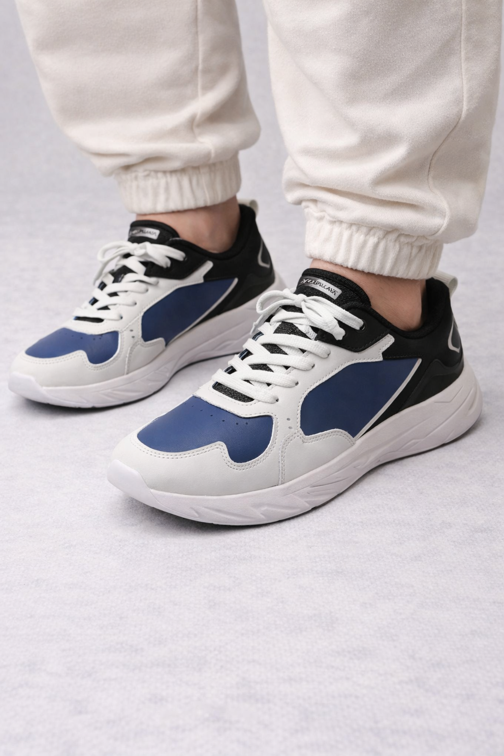 Xtep: Blue-black-white