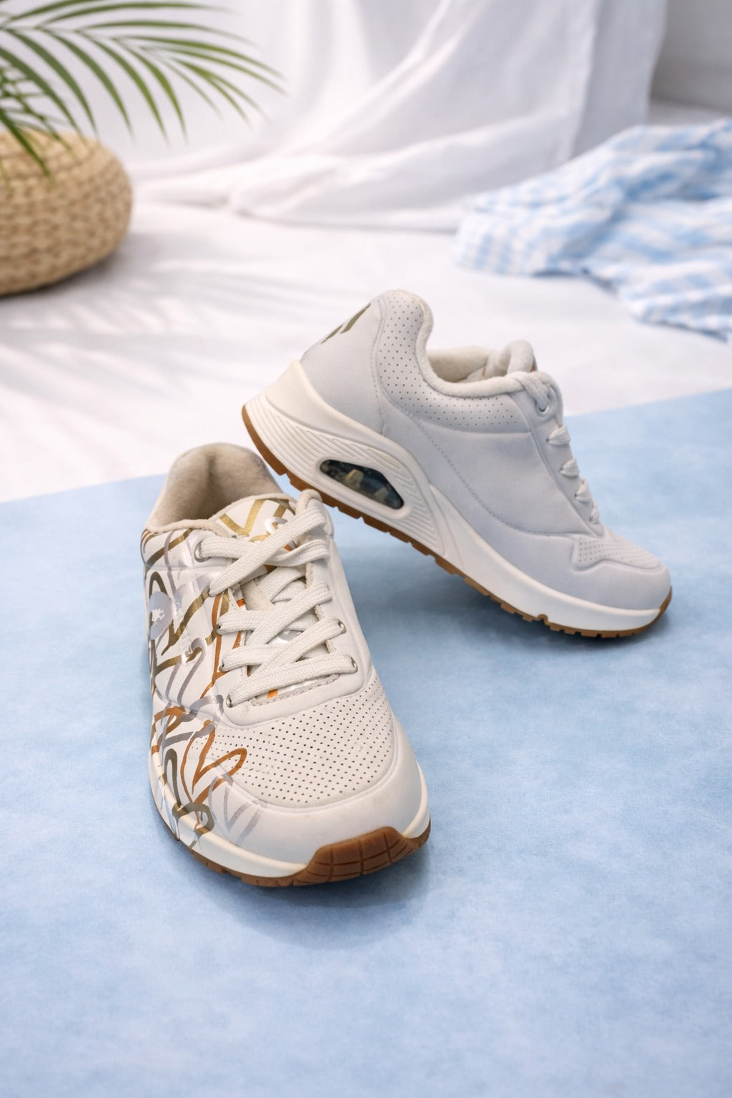 Skechers: White with Orange Patterns