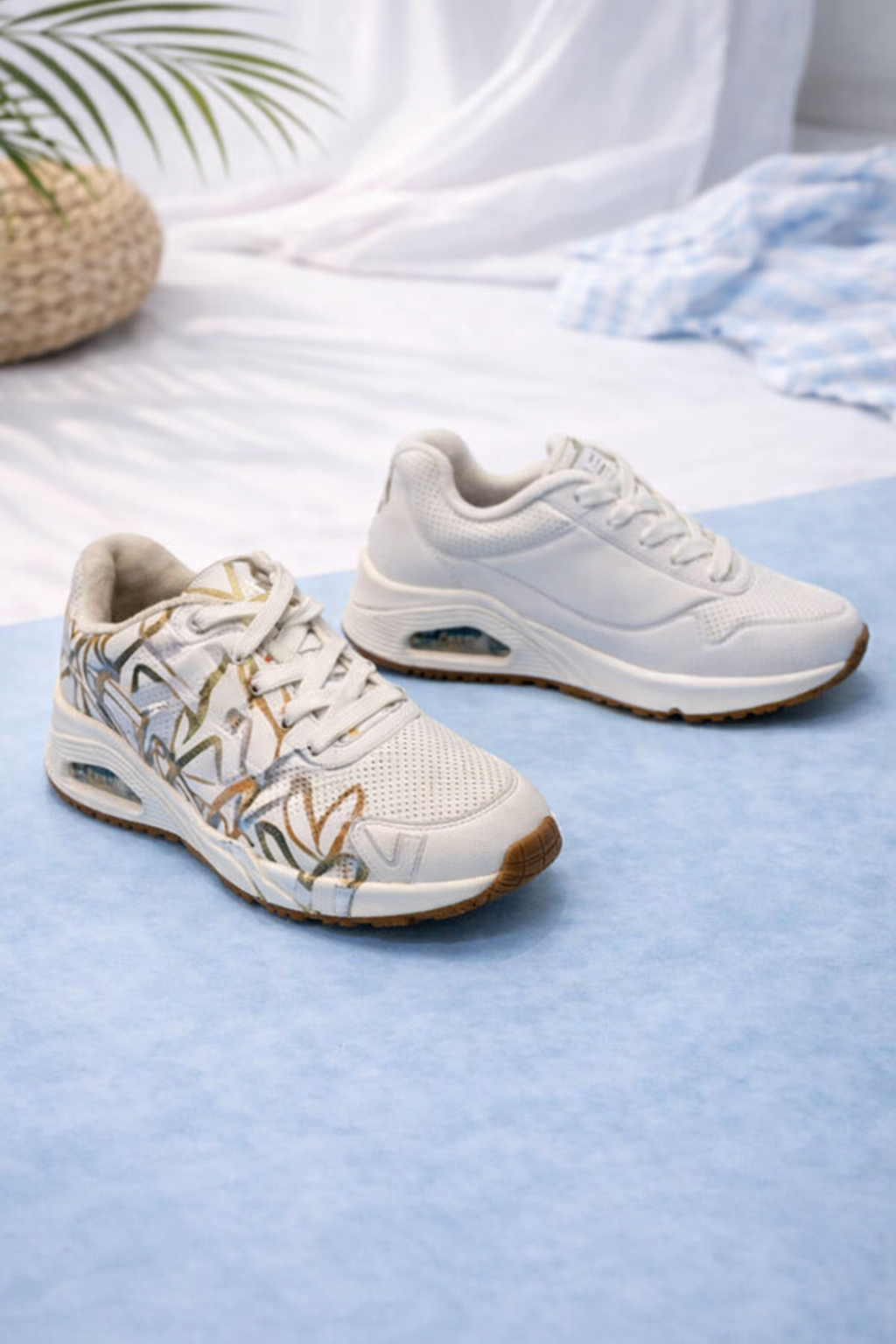 Skechers: White with Orange Patterns