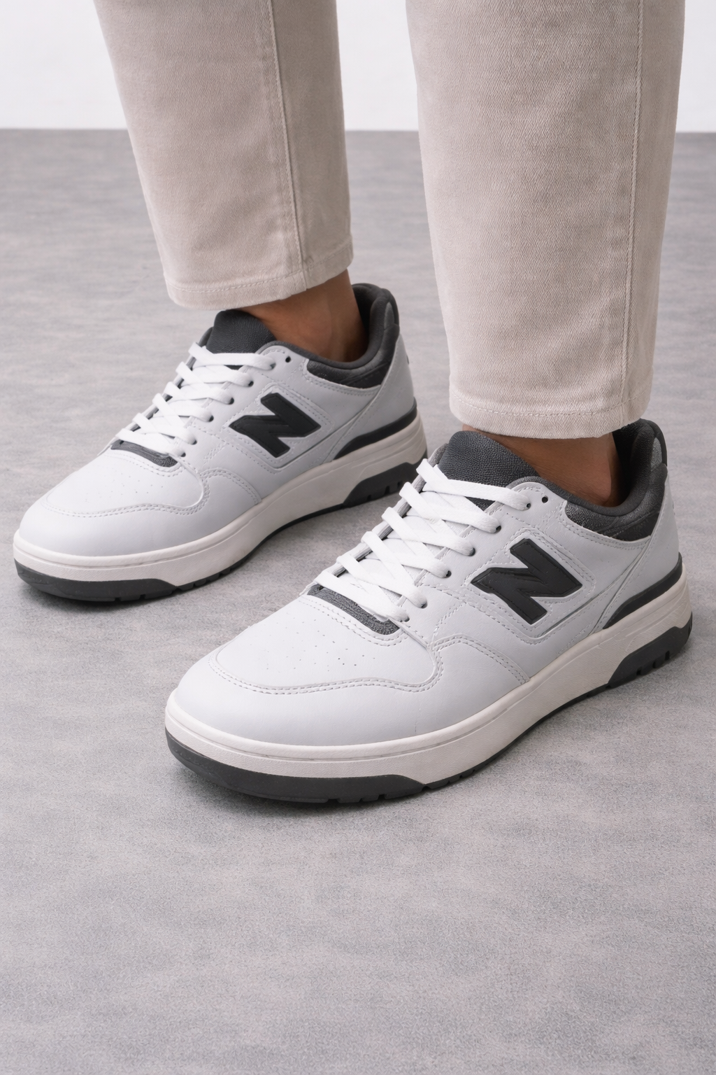 NB: White sneakers with black accents
