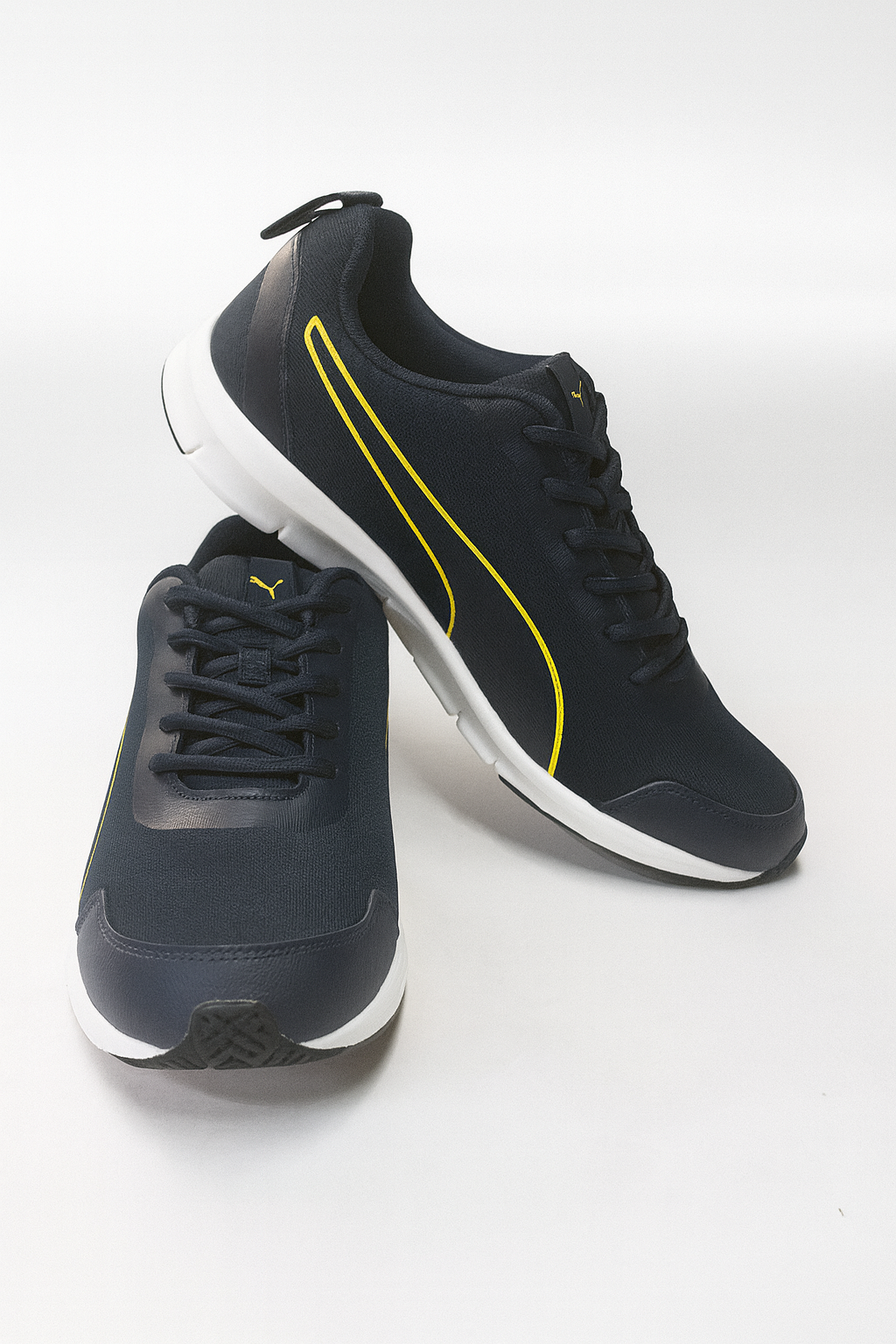 Puma: Dark Blue with Yellow Design